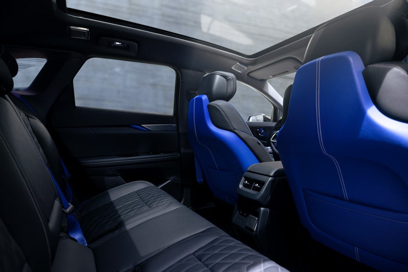 Back Seat View of the 2026 OPTIQ-V Blue Front Seats, Sun Roof, and Interior | Bommarito Cadillac in Saint Peters MO